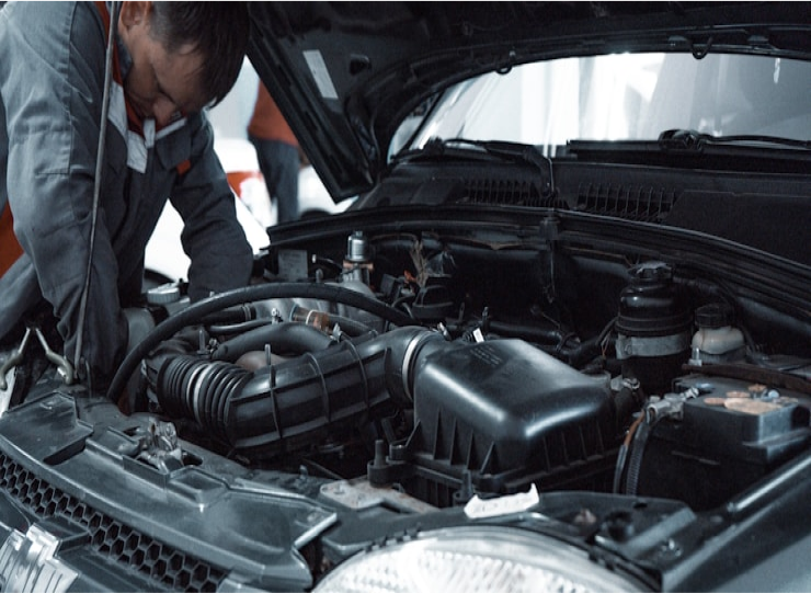 Mechanic performing detailed engine diagnostics 0