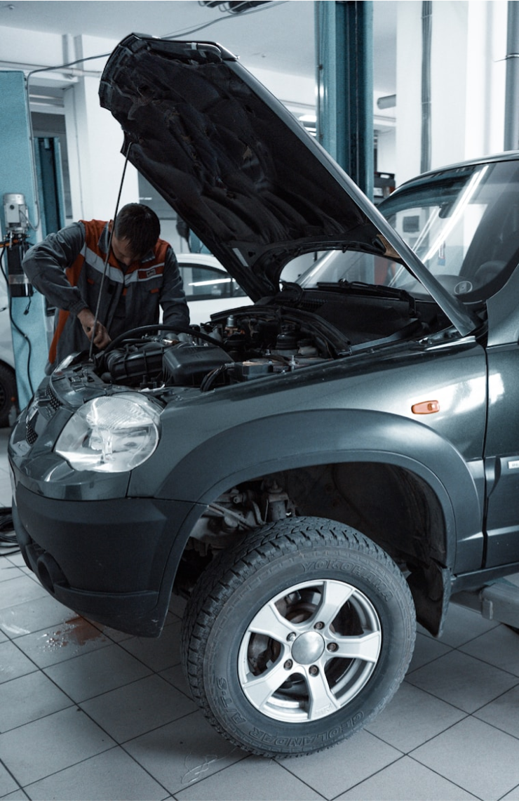Mechanic performing detailed engine diagnostics 0
