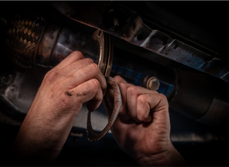 Mechanic performing detailed engine diagnostics 1