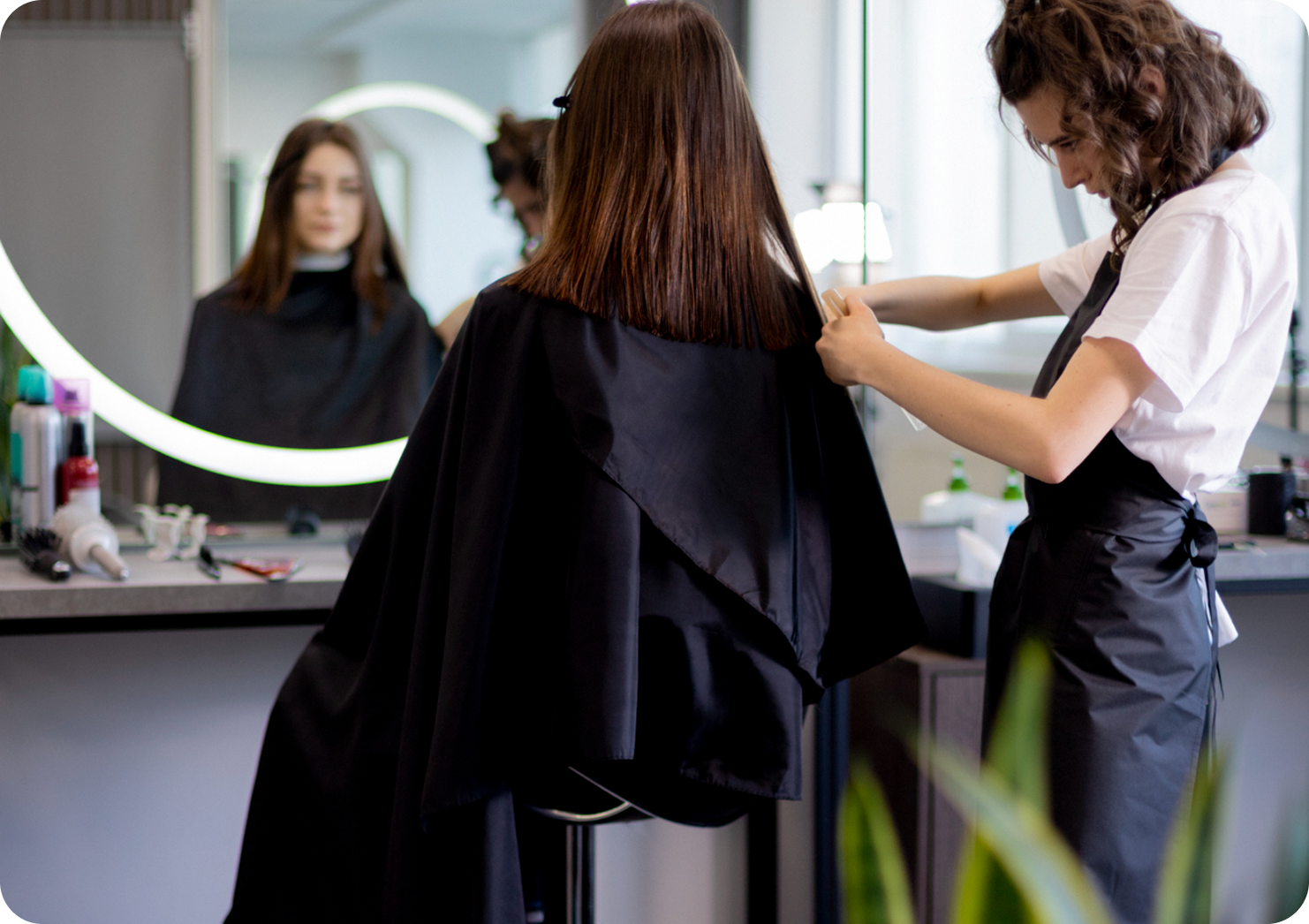 Salon interior showcasing styling area