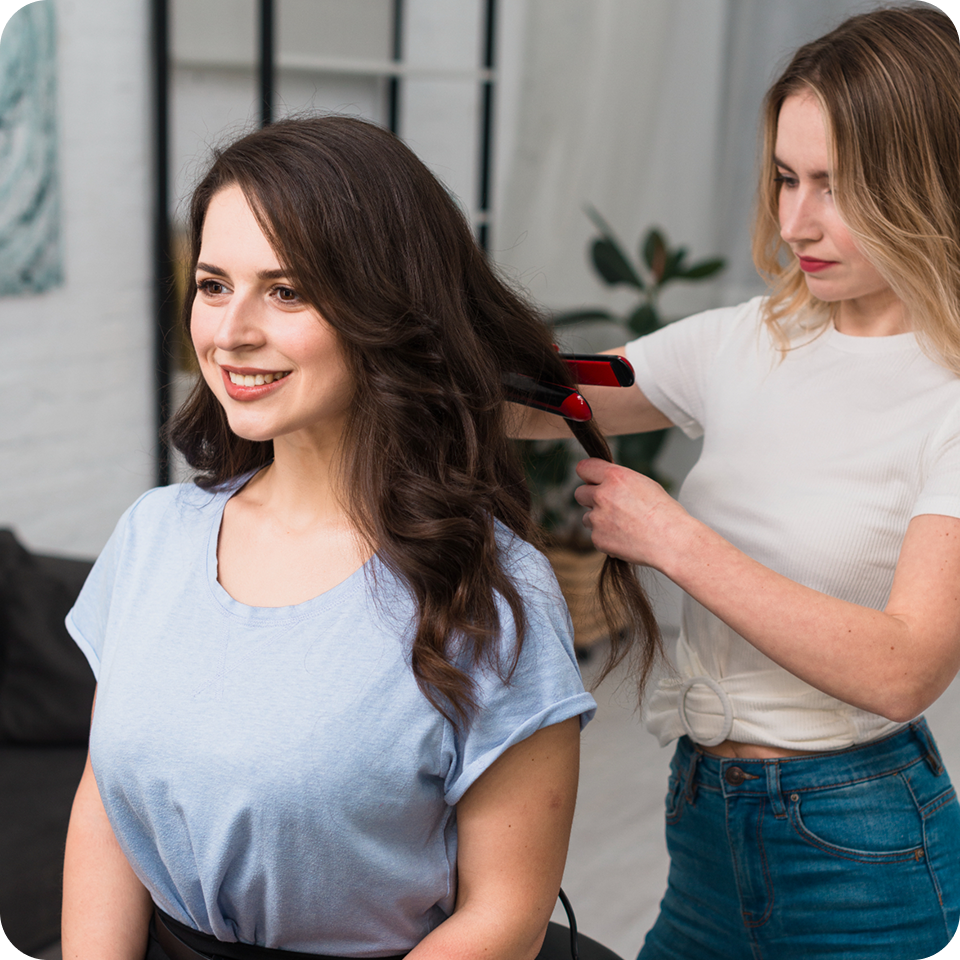 Portrait of a professional hair stylist from our team.